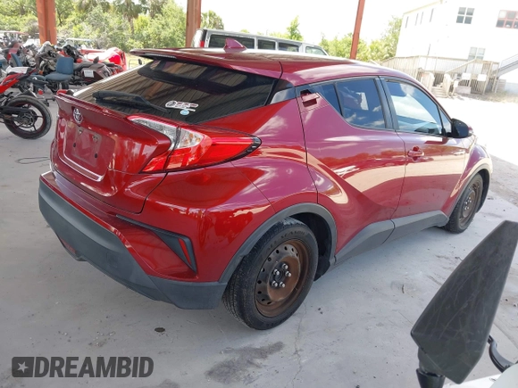 2018 Toyota C-HR XLE with VIN NMTKHMBX0JR058660, listed as a IAAI auction lot 41929790 with 136,358 mi miles. Bid and sale history available at carsss.com. Image 4.