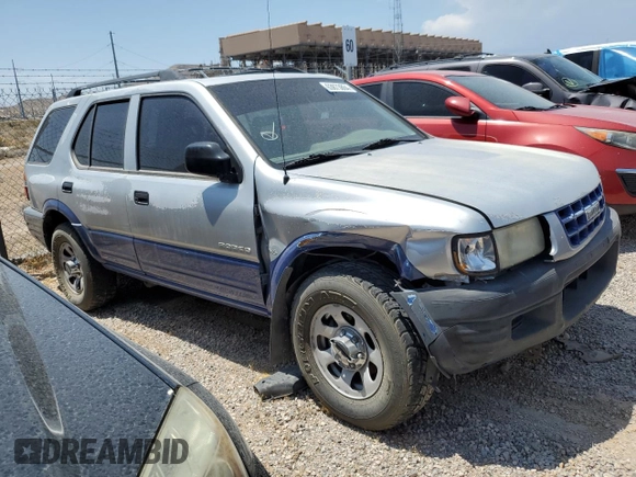 1999 Isuzu Rodeo S with VIN 4S2CK58W2X4361475, listed as a Copart auction lot 63873864 with 232,406 mi miles and Salvage Title. Bid and sale history available at DreamBid. Image 4.