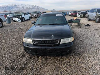 2000 Audi S4 z VIN WAUDD68D0YA031901, wystawiony jako Copart lot #84645964 z przebiegiem 146 868 mil mil oraz Szkody całkowita. Historia ofert i sprzedaży dostępna na DreamBid. Obrazek 5.