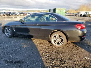 2018 BMW 4 Series 430i xDrive with VIN WBA4Z3C50JEC56661, listed as a Copart auction lot 87767045 with 38,710 mi miles and Salvage Title. Bid and sale history available at DreamBid. Image 2.