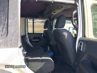 2020 Jeep Wrangler Unlimited Sport with VIN 1C4HJXDM2LW262867, listed as a IAAI auction lot 42303520 with 56,461 mi miles and . Bid and sale history available at DreamBid. Image 8.