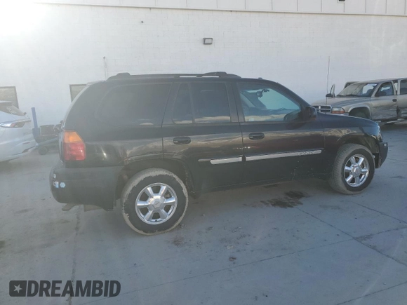 2005 GMC Envoy SLE with VIN 1GKDT13S452285975, listed as a Copart auction lot 46371785 with 358,411 mi miles and Salvage Title. Bid and sale history available at carsss.com. Image 3.