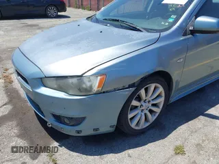 2008 Mitsubishi Lancer GTS z VIN JA3AU86U38U021896, wystawiony jako IAAI lot #42294311 z przebiegiem 188 937 mil mil oraz . Historia ofert i sprzedaży dostępna na DreamBid. Obrazek 14.