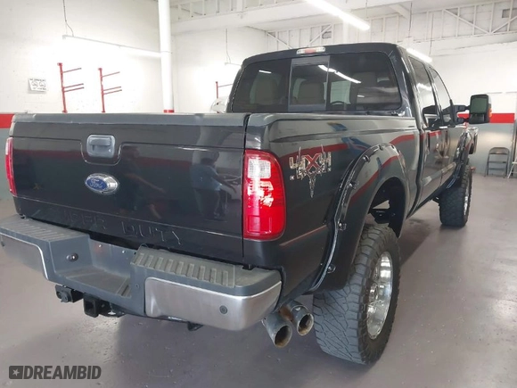 2015 Ford Super Duty F-250 SRW Lariat with VIN 1FT7W2BT1FED13599, listed as a IAAI auction lot 41987618 with 174,728 mi miles. Bid and sale history available at carsss.com. Image 4.