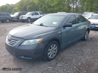 2007 Toyota Camry Hybrid with VIN 4T1BB46K77U006847, listed as a IAAI auction lot 39392090 with 999,999 mi miles. Bid and sale history available at carsss.com. Image 2.