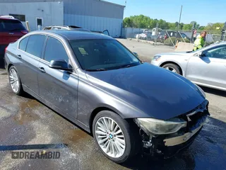 2013 BMW 3 Series ActiveHybrid 3 with VIN WBA3F9C5XDF484346, listed as a IAAI auction lot 41998341 with 145,271 mi miles. Bid and sale history available at carsss.com. Image 1.