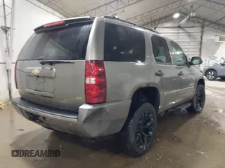 2009 Chevrolet Tahoe LTZ with VIN 1GNFK33049R143390, listed as a IAAI auction lot 41747041 with 209,492 mi miles and . Bid and sale history available at DreamBid. Image 4.