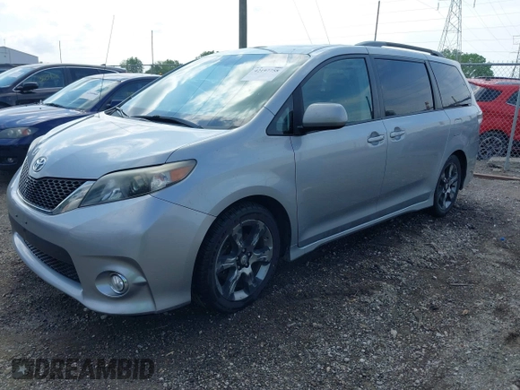 2011 Toyota Sienna SE with VIN 5TDXK3DC4BS152605, listed as a IAAI auction lot 42197758 with 202,829 mi miles and . Bid and sale history available at DreamBid. Image 2.