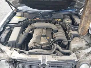1997 Mercedes-Benz E-Class with VIN WDBJF55FXVJ033553, listed as a IAAI auction lot 41425117 with 280,019 mi miles. Bid and sale history available at carsss.com. Image 10.