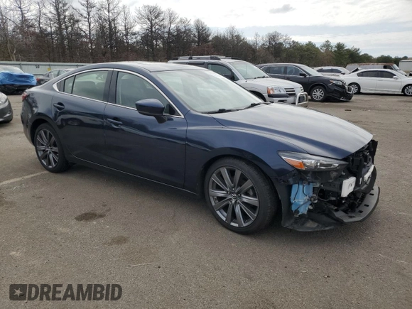 2018 Mazda 6 Grand Touring with VIN JM1GL1TY6J1323672, listed as a Copart auction lot 52700165 with 34,005 mi miles and Salvage Title. Bid and sale history available at DreamBid. Image 4.