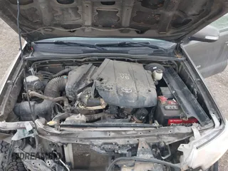2014 Toyota Tacoma with VIN 3TMMU4FN7EM067182, listed as a IAAI auction lot 41108551 with 156,398 mi miles and . Bid and sale history available at DreamBid. Image 10.