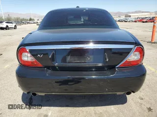 2009 Jaguar XJ 8 with VIN SAJWA71B79SH30431, listed as a Copart auction lot 52403185 with 67,143 mi miles and Salvage Title. Bid and sale history available at DreamBid. Image 6.