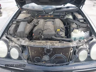 2000 Mercedes-Benz E-Class with VIN WDBJF65JXYA997410, listed as a IAAI auction lot 41939485 with 158,559 mi miles. Bid and sale history available at carsss.com. Image 10.