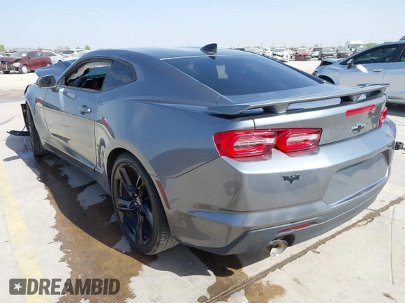 2021 Chevrolet Camaro 1LT z VIN 1G1FB1RX9M0125698, wystawiony jako IAAI lot #41824653 z przebiegiem 69 365 mil mil oraz . Historia ofert i sprzedaży dostępna na DreamBid. Obrazek 3.
