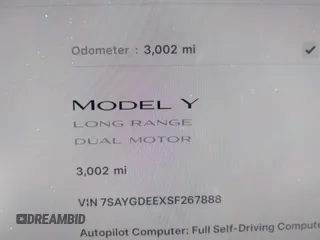 2025 Tesla Model Y Long Range with VIN 7SAYGDEEXSF267888, listed as a IAAI auction lot 41807129 with 3,002 mi miles and . Bid and sale history available at DreamBid. Image 15.