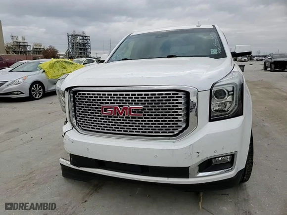 2016 GMC Yukon Denali with VIN 1GKS1CKJ2GR348826, listed as a Copart auction lot 42986055 with 0 mi miles and Salvage Title. Bid and sale history available at carsss.com. Image 10.