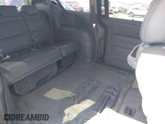 2007 Honda Odyssey EX-L with VIN 5FNRL38727B092077, listed as a IAAI auction lot 41972810 with 211,770 mi miles and . Bid and sale history available at DreamBid. Image 8.