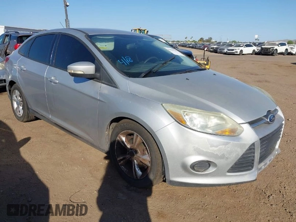 2013 Ford Focus SE with VIN 1FADP3F29DL153736, listed as a IAAI auction lot 42006149 with 176,935 mi miles. Bid and sale history available at carsss.com. Image 1.