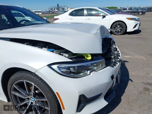 2021 BMW 3 Series 330i xDrive with VIN WBA5R7C0XMFK54525, listed as a IAAI auction lot 42320181 with 54,576 mi miles and . Bid and sale history available at DreamBid. Image 17.