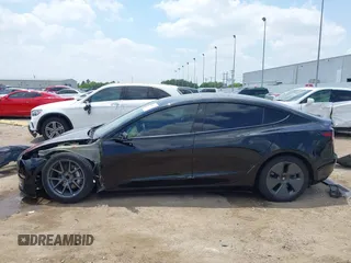 2023 Tesla Model 3 with VIN 5YJ3E1EA8PF454210, listed as a IAAI auction lot 42326822 with 43,200 mi miles and . Bid and sale history available at DreamBid. Image 15.