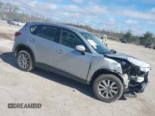2016 Mazda CX-5 Sport with VIN JM3KE4BY6G0655530, listed as a IAAI auction lot 42110227 with 149,386 mi miles and . Bid and sale history available at DreamBid. Image 1.