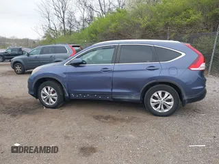 2014 Honda CR-V EX-L with VIN 5J6RM4H71EL092983, listed as a IAAI auction lot 42018356 with 136,024 mi miles. Bid and sale history available at carsss.com. Image 15.