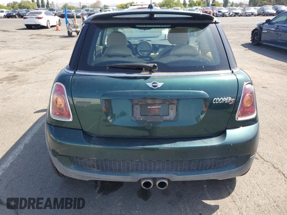 2009 MINI Hardtop S with VIN WMWMF73539TW85698, listed as a Copart auction lot 54957685 with 98,429 mi miles and Clean Title. Bid and sale history available at DreamBid. Image 6.