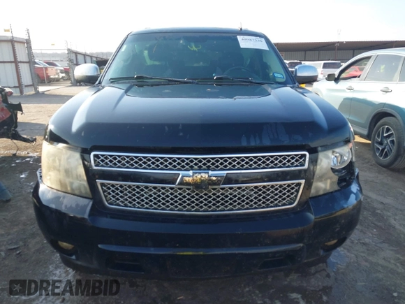 2010 Chevrolet Suburban LTZ with VIN 1GNUCKE07AR276807, listed as a IAAI auction lot 40987330 with 196,618 mi miles. Bid and sale history available at carsss.com. Image 12.