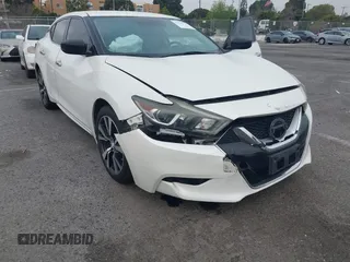 2016 Nissan Maxima SL with VIN 1N4AA6AP3GC448957, listed as a IAAI auction lot 41734717 with 128,687 mi miles and . Bid and sale history available at DreamBid. Image 6.