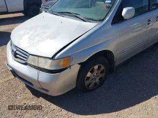 2004 Honda Odyssey EX-L with VIN 5FNRL18904B080009, listed as a IAAI auction lot 41736651 with 461,326 mi miles and . Bid and sale history available at DreamBid. Image 6.