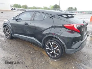 2018 Toyota C-HR XLE with VIN NMTKHMBX4JR032773, listed as a IAAI auction lot 41957588 with 100,691 mi miles. Bid and sale history available at carsss.com. Image 3.