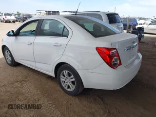 2014 Chevrolet Sonic LT z VIN 1G1JC5SH0E4200669, wystawiony jako IAAI lot #42368021 z przebiegiem 139 845 mil mil oraz . Historia ofert i sprzedaży dostępna na DreamBid. Obrazek 3.