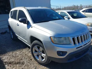 2011 Jeep Compass with VIN 1J4NT1FB8BD248904, listed as a IAAI auction lot 41667133 with 212,887 mi miles. Bid and sale history available at carsss.com. Image 1.