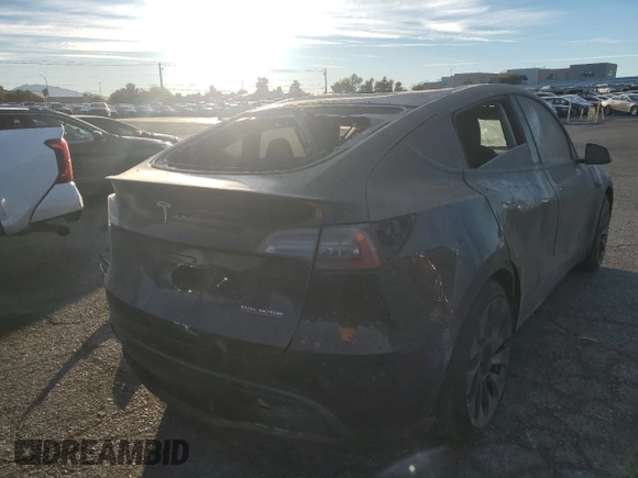 2023 Tesla Model Y Performance with VIN 7SAYGDEF5PF966796, listed as a Copart auction lot 88097325 with 6,927 mi miles and Salvage Title. Bid and sale history available at DreamBid. Image 3.