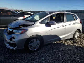 2018 Honda Fit LX with VIN 3HGGK5G46JM703892, listed as a Copart auction lot 79742984 with 67,825 mi miles and Salvage Title. Bid and sale history available at DreamBid. Image 1.