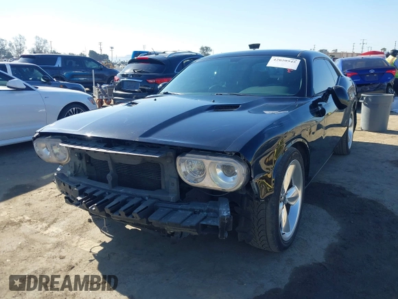 2014 Dodge Challenger R/T z VIN 2C3CDYBT2EH313789, wystawiony jako IAAI lot #42020945 z przebiegiem 182 788 mil mil oraz . Historia ofert i sprzedaży dostępna na DreamBid. Obrazek 2.