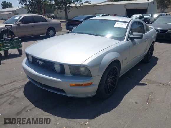 2006 Ford Mustang GT Deluxe with VIN 1ZVHT82H365238039, listed as a IAAI auction lot 42582693 with 129,327 mi miles and . Bid and sale history available at DreamBid. Image 2.