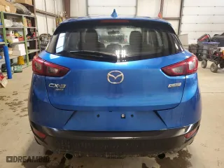 2017 Mazda CX-3 Sport with VIN JM1DKFB73H0142847, listed as a Copart auction lot 52140845 with 90,247 mi miles and Salvage Title. Bid and sale history available at carsss.com. Image 6.