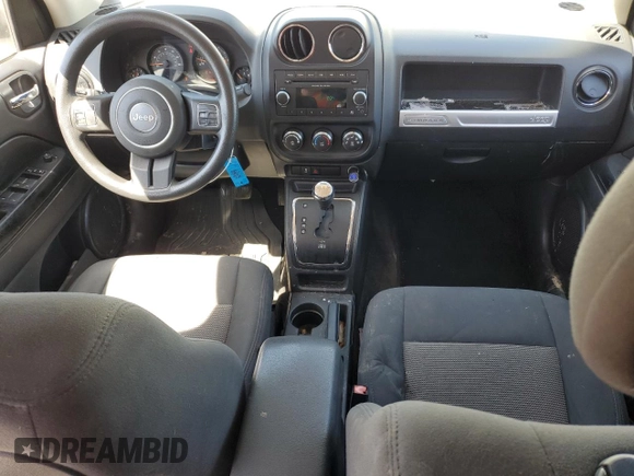 2014 Jeep Compass Sport with VIN 1C4NJCBA5ED671061, listed as a Copart auction lot 51953315 with 81,530 mi miles and Salvage Title. Bid and sale history available at DreamBid. Image 8.