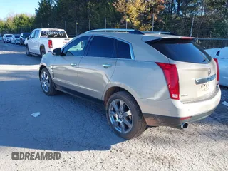 2011 Cadillac SRX Performance Collection with VIN 3GYFNBEY3BS529406, listed as a IAAI auction lot 40926089 with 160,535 mi miles. Bid and sale history available at carsss.com. Image 3.