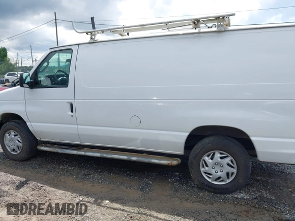 2012 Ford Econoline Cargo Recreational with VIN 1FTNE2EW9CDB05469, listed as a IAAI auction lot 42473914 with 162,920 mi miles and . Bid and sale history available at DreamBid. Image 14.