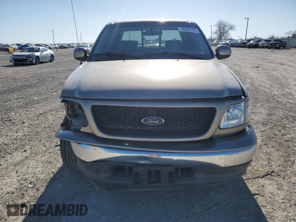 2003 Ford F-150 XLT with VIN 1FTRW07623KB92840, listed as a Copart auction lot 48603105 with 145,516 mi miles and Salvage Title. Bid and sale history available at carsss.com. Image 5.