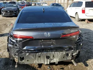 2024 Honda Civic Sedan Touring with VIN 2HGFE1F92RH325802, listed as a Copart auction lot 43206405 with 22,850 mi miles and Salvage Title. Bid and sale history available at carsss.com. Image 6.