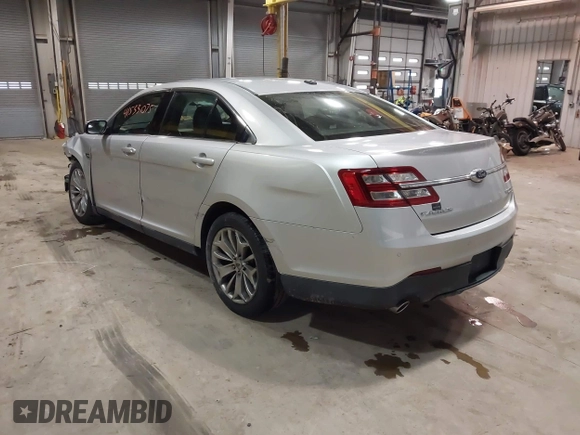2013 Ford Taurus Limited with VIN 1FAHP2F83DG116657, listed as a IAAI auction lot 41533075 with 124,649 mi miles. Bid and sale history available at carsss.com. Image 3.