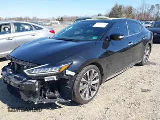 2023 Nissan Maxima Platinum with VIN 1N4AA6FV4PC504993, listed as a IAAI auction lot 41848228 with 27,585 mi miles. Bid and sale history available at carsss.com. Image 2.