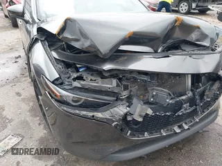 2021 Mazda 3 Premium z VIN JM1BPAML1M1318708, wystawiony jako IAAI lot #42178243 z przebiegiem 62 455 mil mil oraz . Historia ofert i sprzedaży dostępna na DreamBid. Obrazek 6.