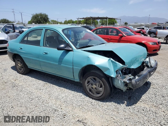 1999 Ford Escort LX with VIN 1FAFP10P6XW196483, listed as a Copart auction lot 59215635 with 74,859 mi miles and Salvage title. Bid and sale history available at DreamBid. Image 4.