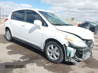 2009 Nissan Versa 1.8 S with VIN 3N1BC13E19L371006, listed as a IAAI auction lot 42064633 with 67,424 mi miles. Bid and sale history available at carsss.com. Image 1.