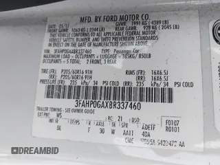 2011 Ford Fusion S with VIN 3FAHP0GAXBR337460, listed as a IAAI auction lot 41727079 with 247,696 mi miles. Bid and sale history available at carsss.com. Image 9.