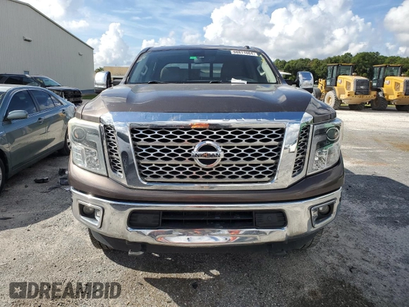 2016 Nissan Titan XD Platinum Reserve with VIN 1N6BA1F20GN500500, listed as a Copart auction lot 75396354 with 164,966 mi miles and Salvage Title. Bid and sale history available at carsss.com. Image 5.